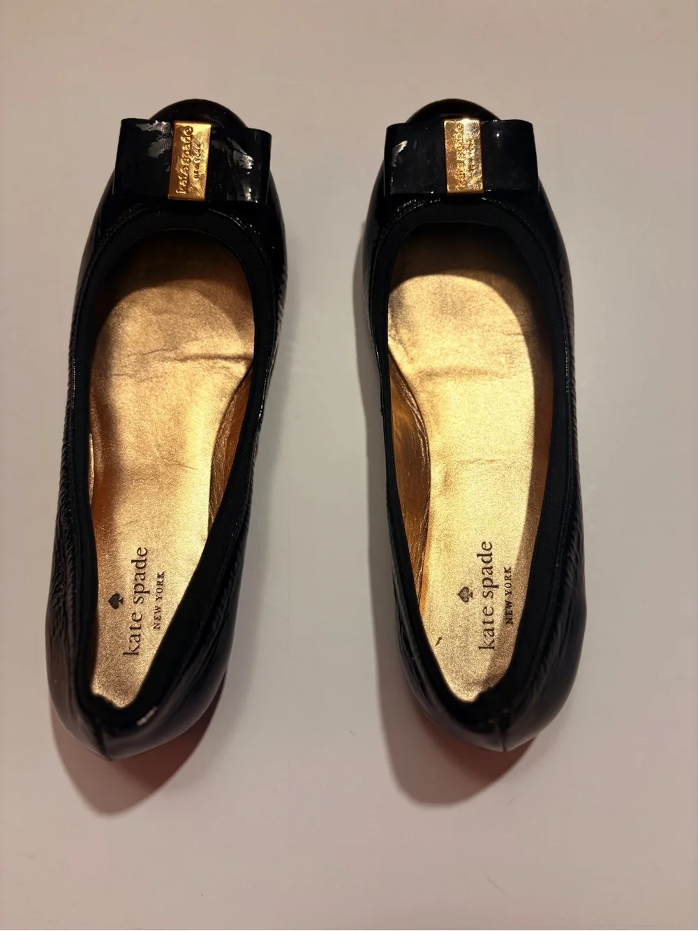 kate spade Black Patent Leather Bow Flats with Gold Plaque